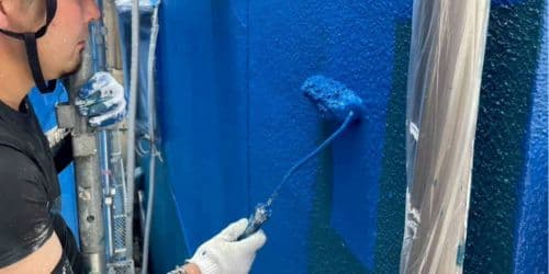 茨木市総持寺 外壁塗装 上塗り 無機塗料 鮮やかなブルー 高耐候仕上げ